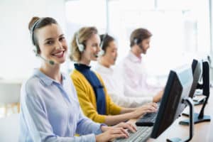 Customer service executives working in call c